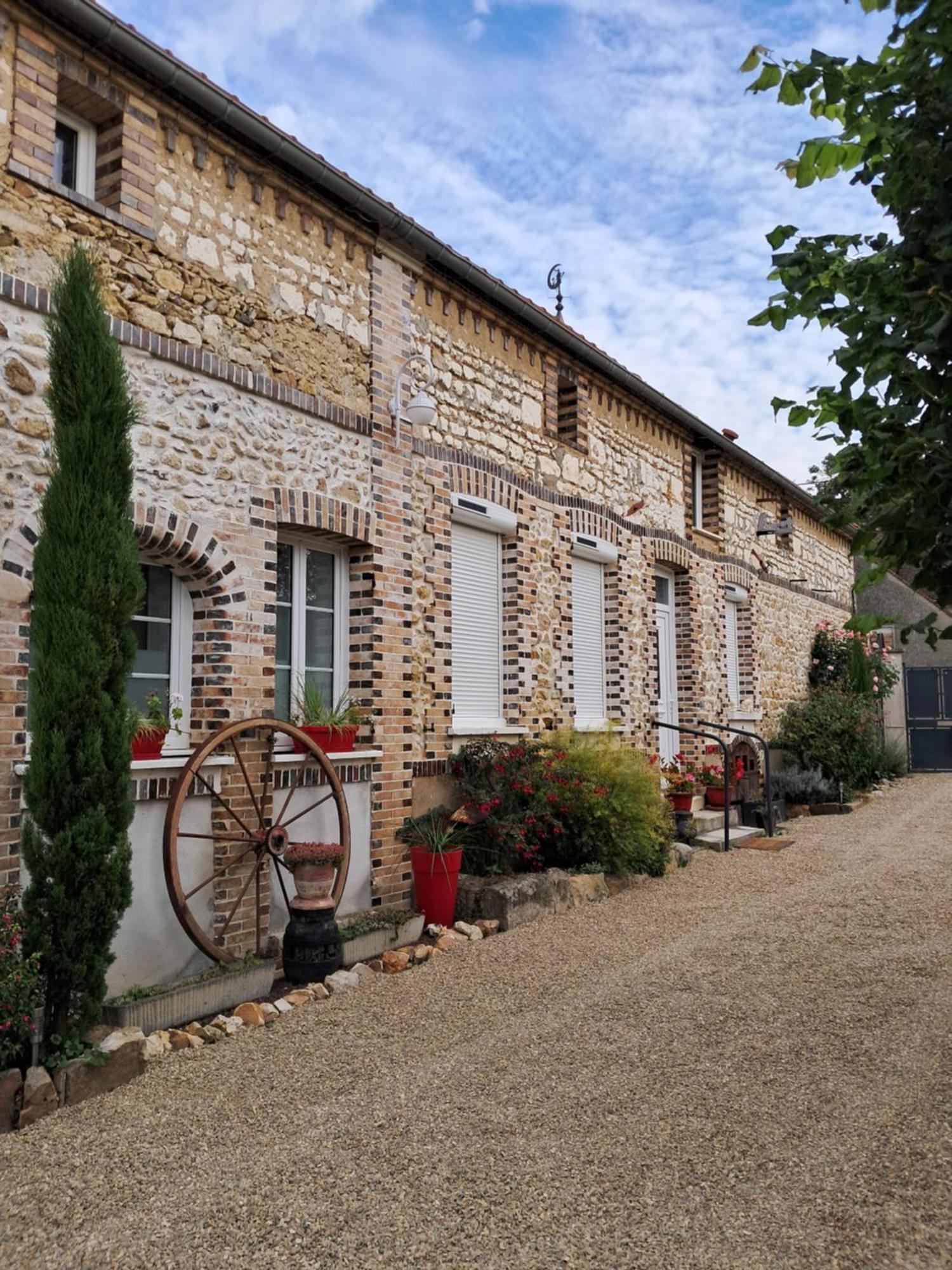 Maison Longere Les Camelias Vinneuf Exterior foto